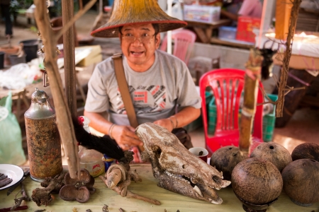 Thailand - March 24: people selling boar skulls in Thailandのeditorial素材