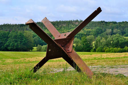 metal hedgehog anti-tank roadblock at the Cold War border, Dyje, Czech Republicの写真素材