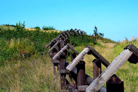 picture An unusual wooden fence in the Eagle Nest protected landscape area, Polandの写真素材