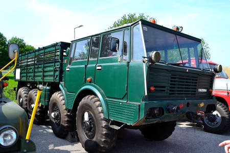 photographs of legends of trucks used in the army in the modification of the flatbed, a display of...