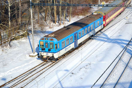 a train set led by a motor car of the 842 series enters the Ostrava-stÅed railway station, 15 February 2021, Ostrava, North Moravia, Czech Republicのeditorial素材