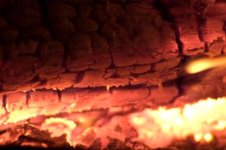 burning wood in fireplace close up shoot