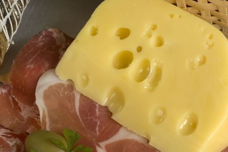 cheese and some prosciutto close up shootの写真素材