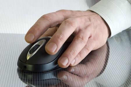hand on computer mouse close up shoot