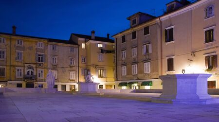 old street in Slovenia coast town Piran at duskの写真素材
