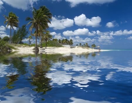 island disappearing under water - global warming conceptの写真素材