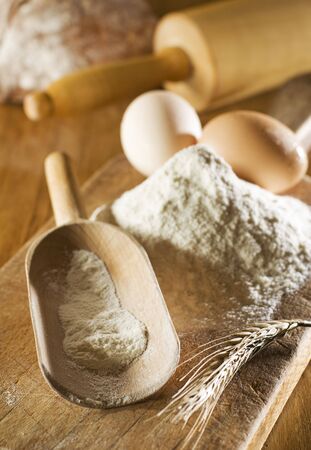 flour an eggs on board close up shootの写真素材