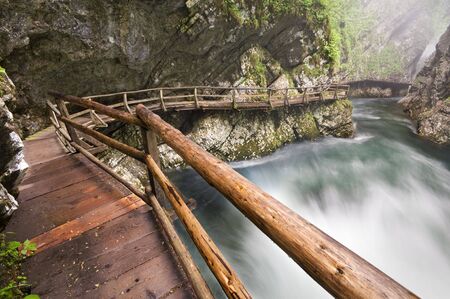 Beautiful wooden path by the river canyon Vintgar in Sloveniaの写真素材