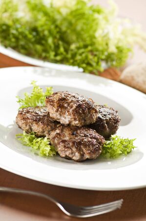 Fresh meat balls with salad close up shootの写真素材