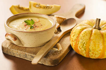 Fresh orange pumpkin soup close up shootの写真素材