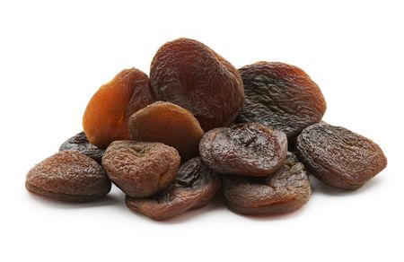 Group of dried natural Apricots isolated on white の写真素材