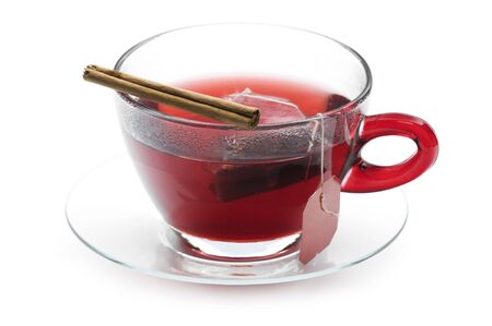 Cup of red hot tea isolated on whiteの写真素材