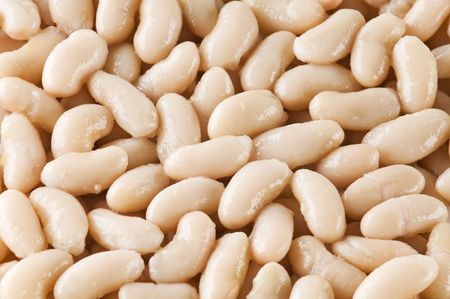 Cooked white beans background close up shoot