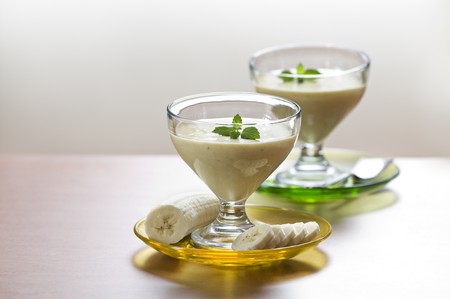 Fresh banana smoothie with mint close up shootの写真素材