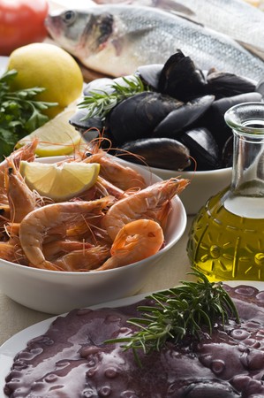 Fresh raw seafood with herbs close up shootの写真素材