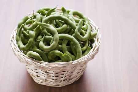 Green beans in basket close up shootの写真素材