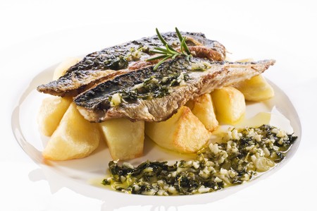 Fresh mackerel fillet with baked potato close upの写真素材