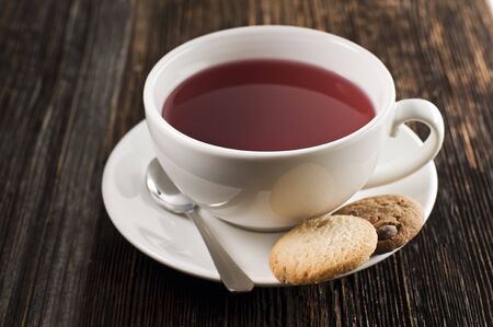Cup of hot tea with cookies close up shootの写真素材
