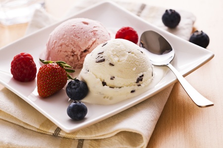 Fresh fruit and stracciatella ice cream close upの写真素材