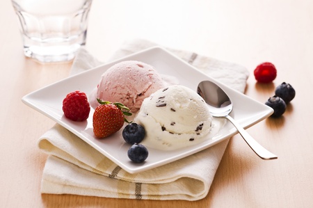 Fresh fruit and stracciatella ice cream close upの写真素材