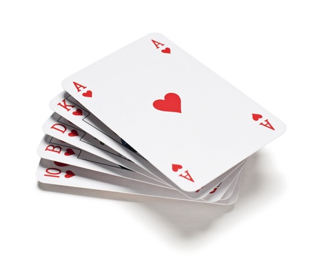 A royal straight flush playing cards on whiteの写真素材