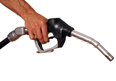 Male hand holding black pump isolated on whiteの写真素材