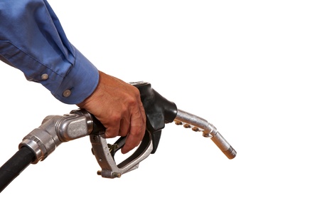 Male hand holding black pump isolated on whiteの写真素材