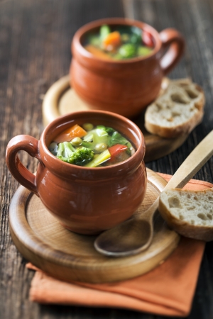 Vegeterian soup on wooden background close upの写真素材