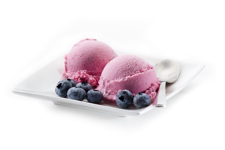Fresh blueberry ice cream on white background close up