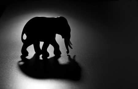 Elephant figure on a dark backgroundの写真素材