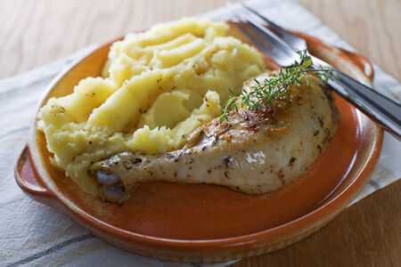 Roasted chicken with mash potatoes close upの写真素材