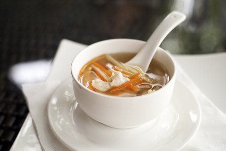 Chinese chicken soup in restaurant close upの写真素材