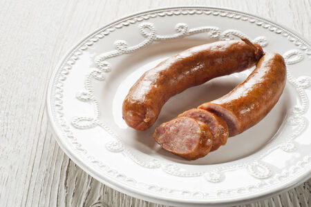 the sliced tasty sausage on a plate close upの写真素材