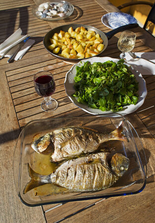 Tasty fresh sea fish for lunch outdoor. Culinary healthy cooking.の写真素材