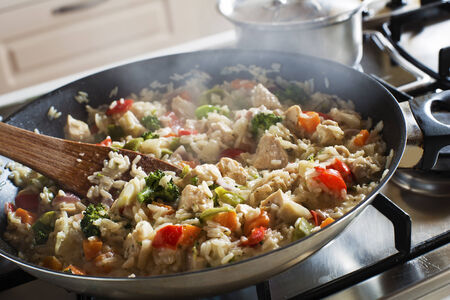 Risotto cooking on the stove close-upの写真素材