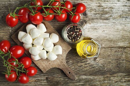 Mozzarella Cheese with Tomatoes and olive oilの写真素材