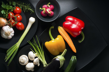 Vegetables on black background overhead close up shootの写真素材