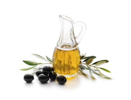 Olive oil and olive branch isolated on whiteの写真素材