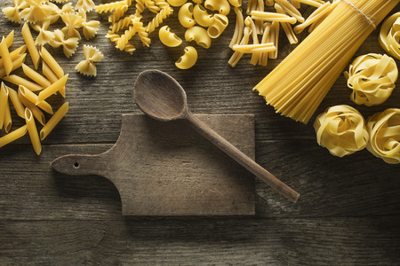 Pasta collection on rustic wooden backgroundの写真素材