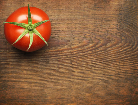 Fresh cherry tomato on rustic wooden backgroundの写真素材