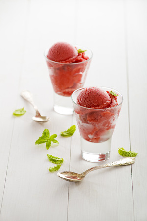 Fresh fruit sorbet ice cream in a glassの写真素材