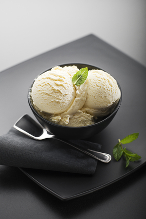 Ice cream on a black background close upの写真素材