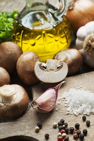 Ingredients with fresh mushrooms- champignons close upの写真素材