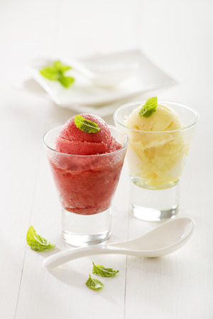 Fresh mixed fruit ice cream sorbet in glass.の写真素材