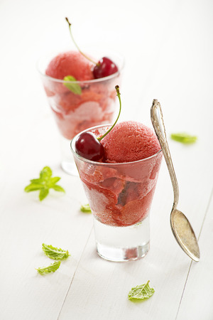 Fresh fruit ice cream sorbet in white bowl.の写真素材