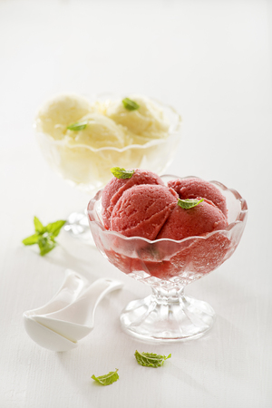 Fresh fruit ice cream in crystal glasses.の写真素材