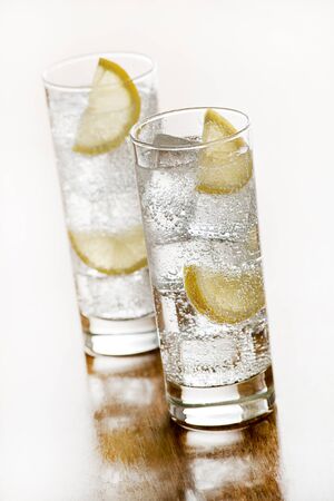 Fresh Mineral water with ice and lemon.の写真素材