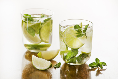 Cold Mojito cocktail on a rustic table.の写真素材