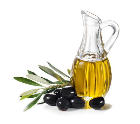 Olive oil and olive branch isolated on white.の写真素材