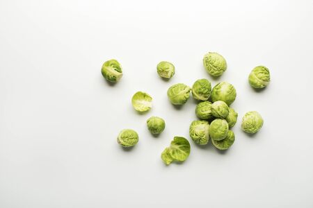 Fresh raw Brussels sprouts isolated on a white background.の写真素材